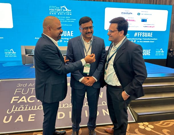 Maran in conversation with two Maxbyte delegates at the Future Factory Show, UAE edition